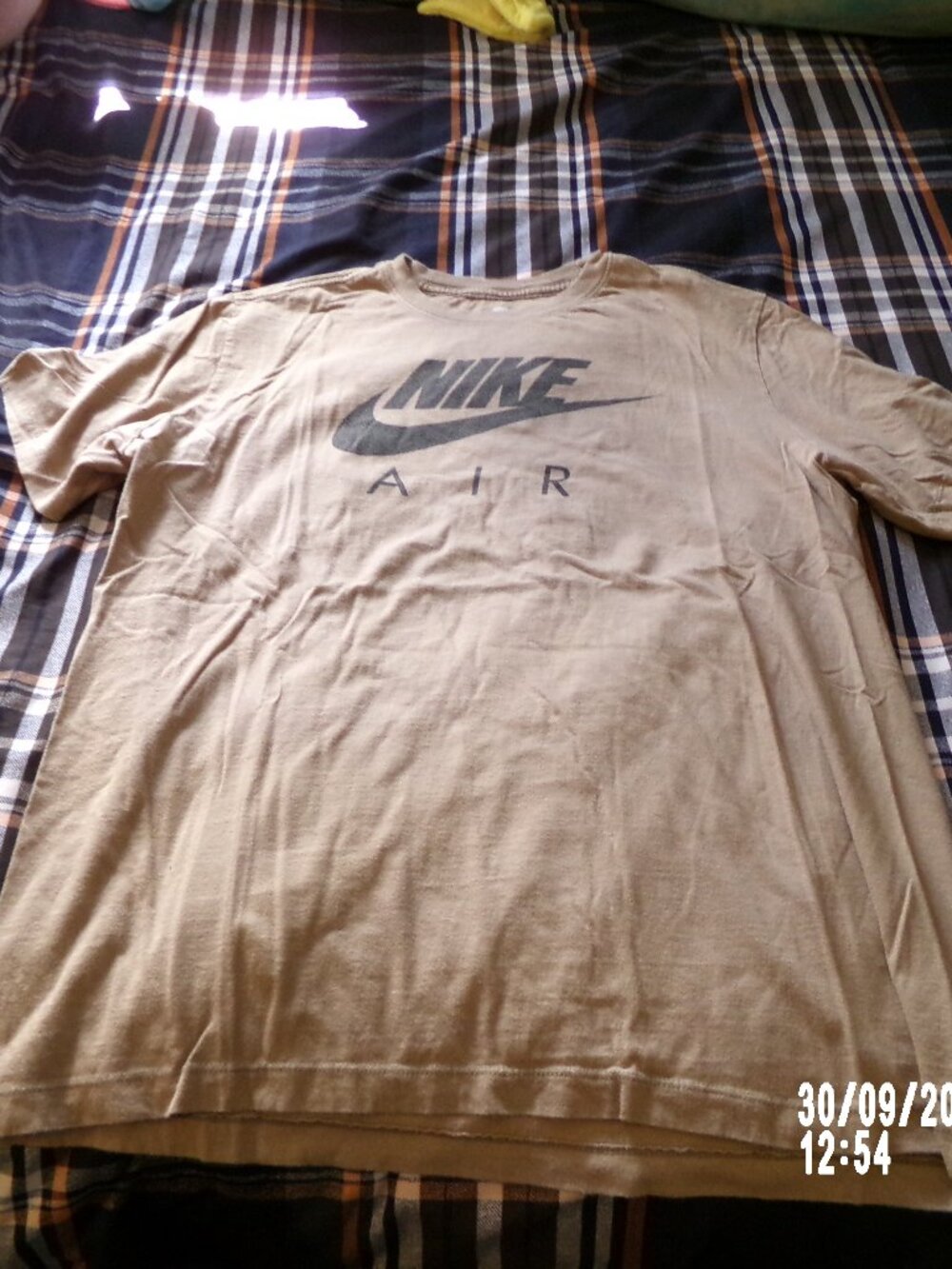 Tan Nike t-shirt
